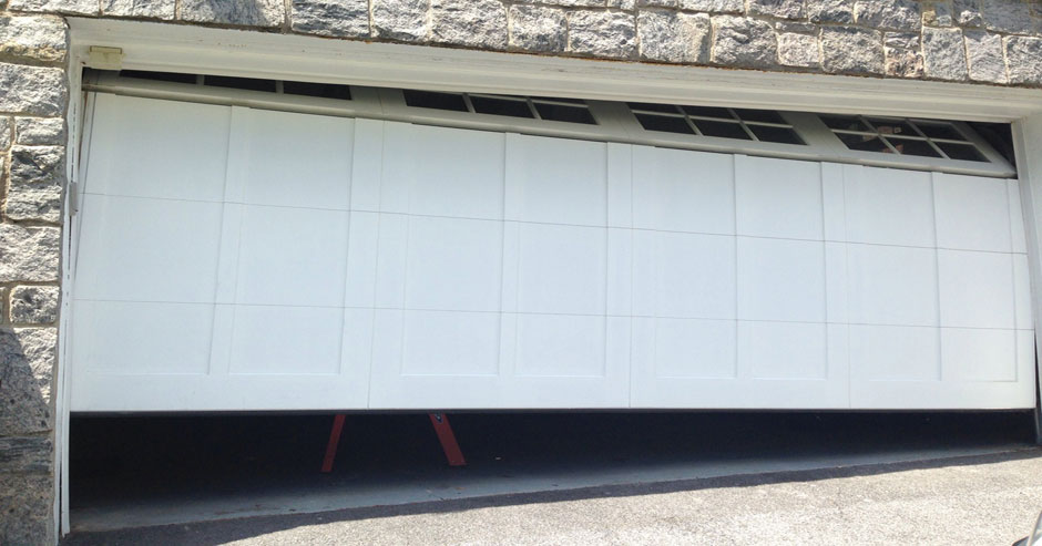 Broken garage door repairs Manchester